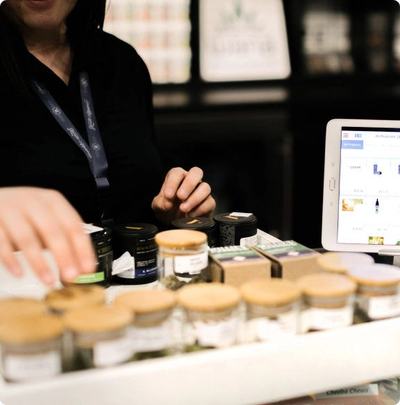 Person selling cannabis flower at a dispensary